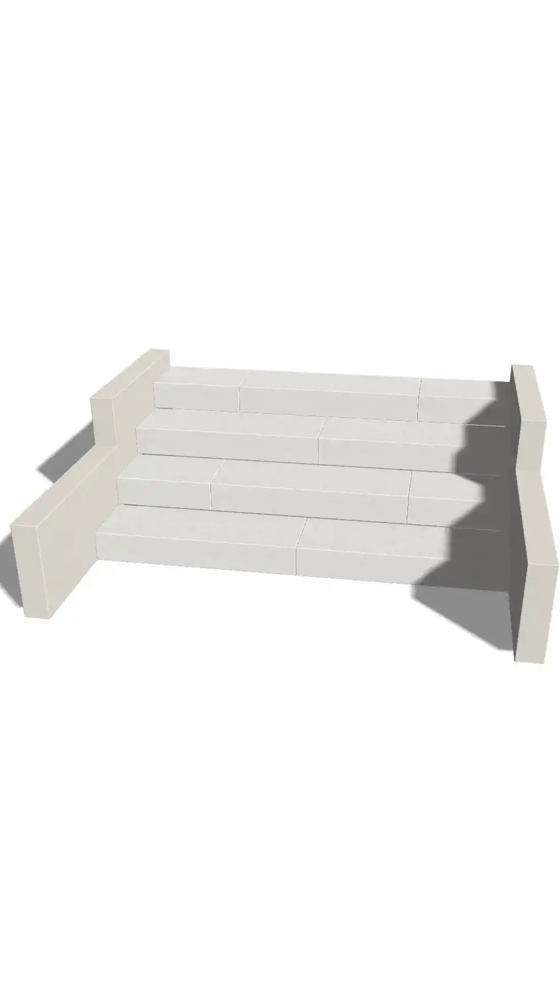 Straight outdoor staircase with four block steps made of light-colored concrete blocks and lateral angle supports